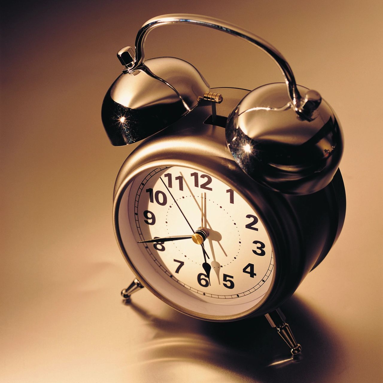old fashioned alarm clock with bells
